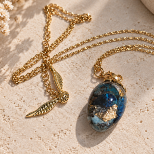 Collier thème Harry "L'œuf d'or"